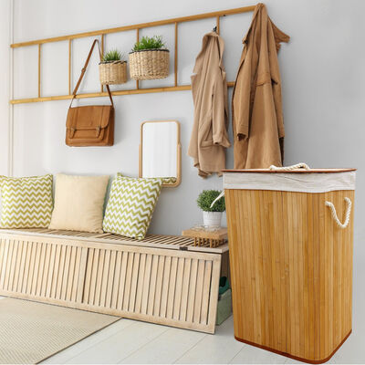 Natural bamboo laundry basket with cotton liner.