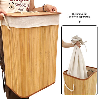 Natural bamboo laundry basket with cotton liner.